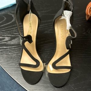 Venus black heels with plastic straps. Sueded